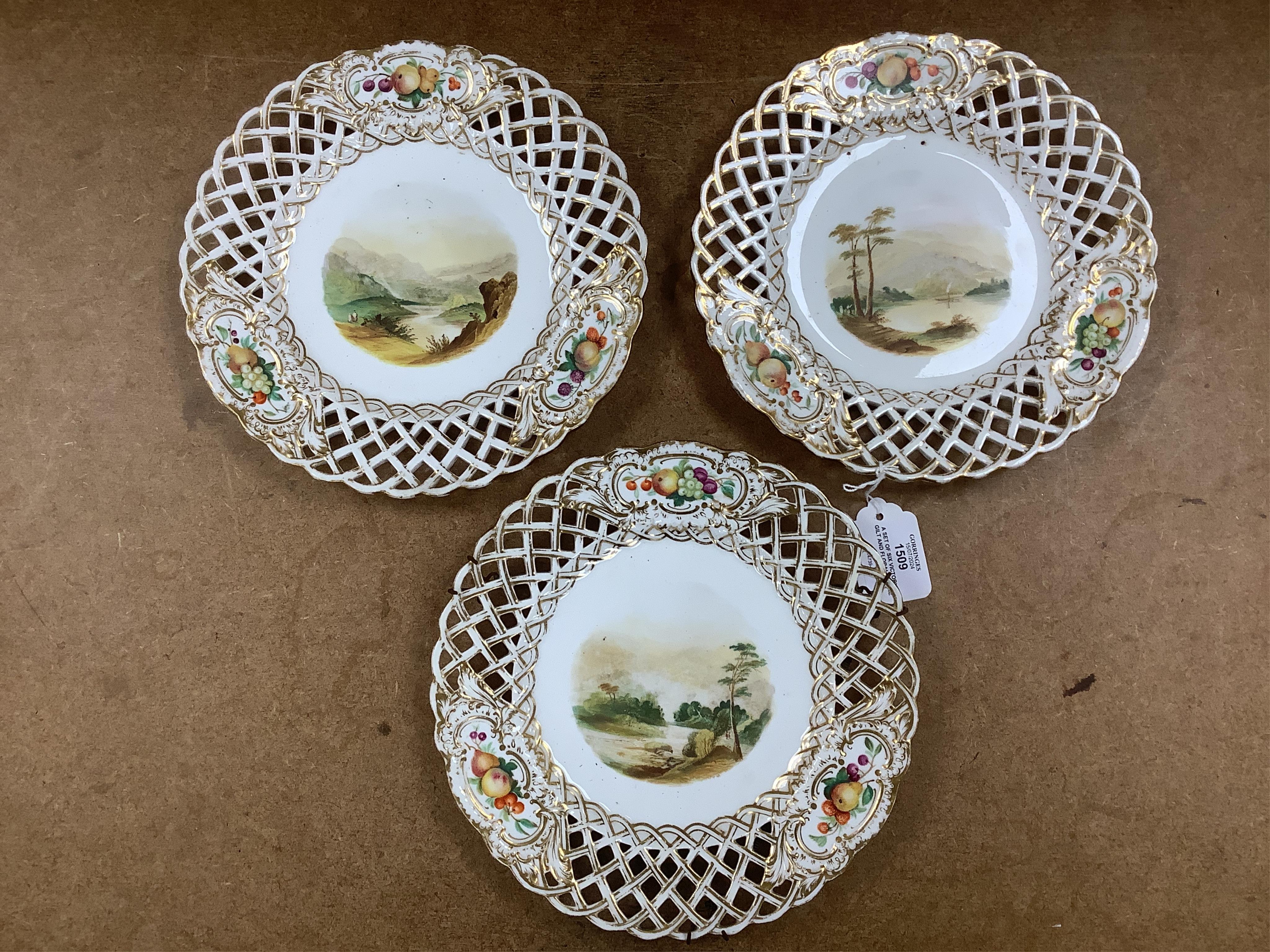 A set of six Victorian gilt and floral cabinet plates with central landscapes, 24cm diameter. Condition - poor